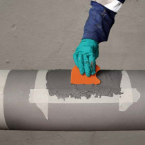 Odbudowa pierwotnego profilu rury z użyciem materiału firmy Belzona w postaci pasty Odbudowa pierwotnego profilu rury z użyciem materiału firmy Belzona w postaci pasty